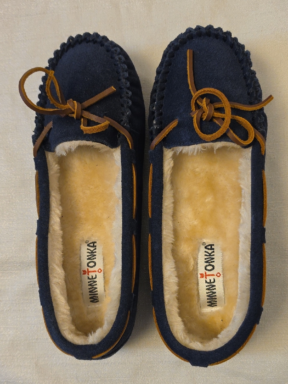 Minnetonka Navy Suede Moccasins with Tan Trim